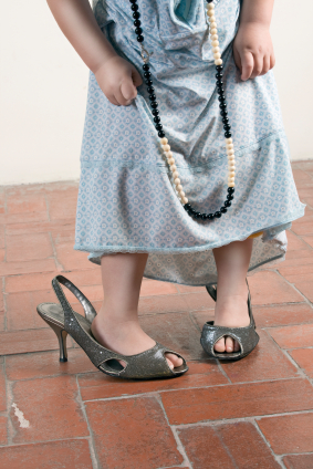 Young girl in older woman's shoes